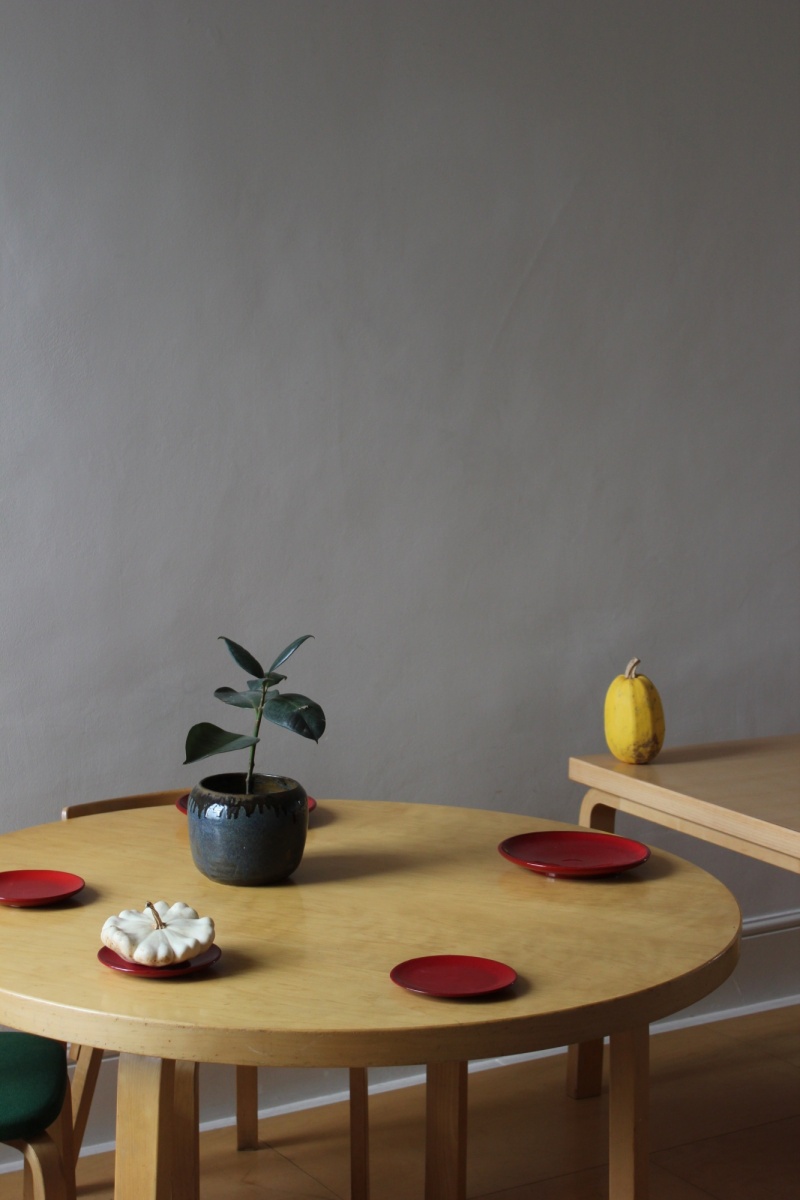 two Alvar Aalto dining tables