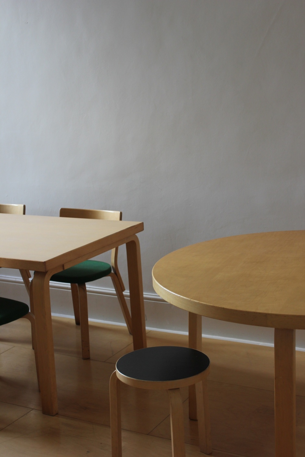 Alvar Aalto stools at a birch table