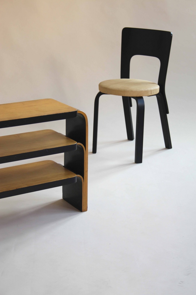 Black chair 66 and shelf 111 by Alvar Aalto
