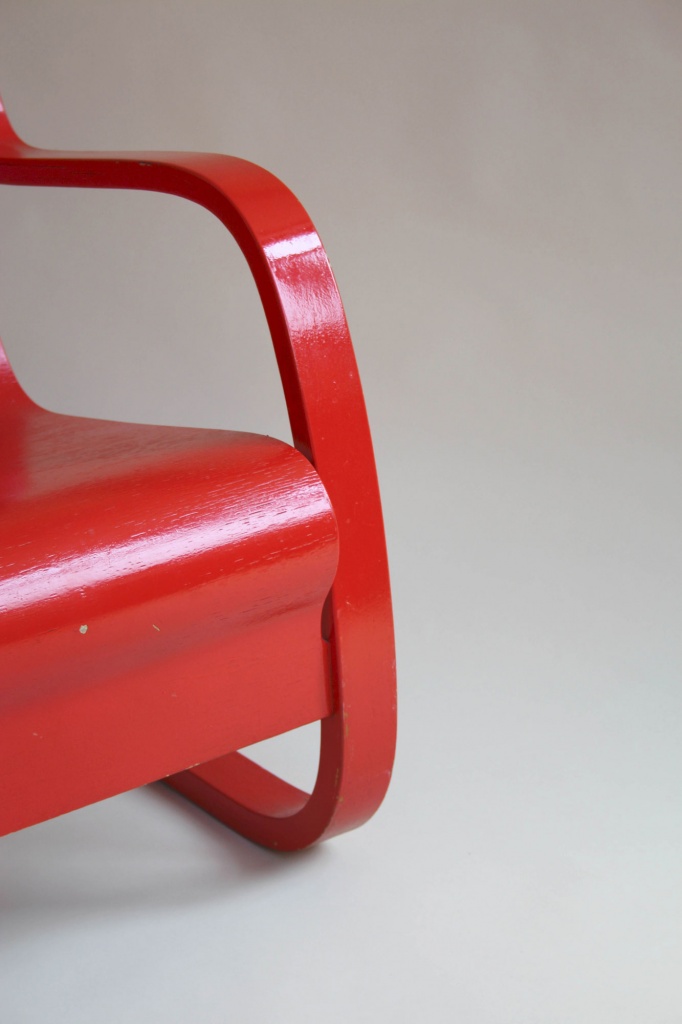 Red cantilever armchair