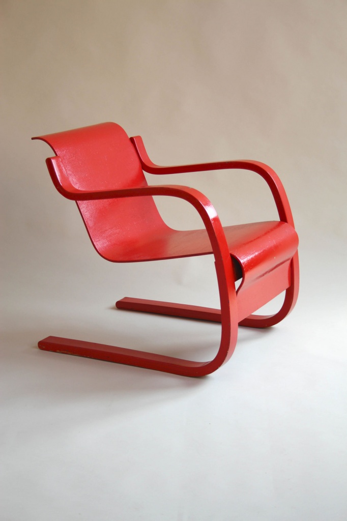 Red cantilever armchair