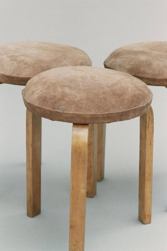 Alvar Aalto stool 60, upholstered in camel colour suede